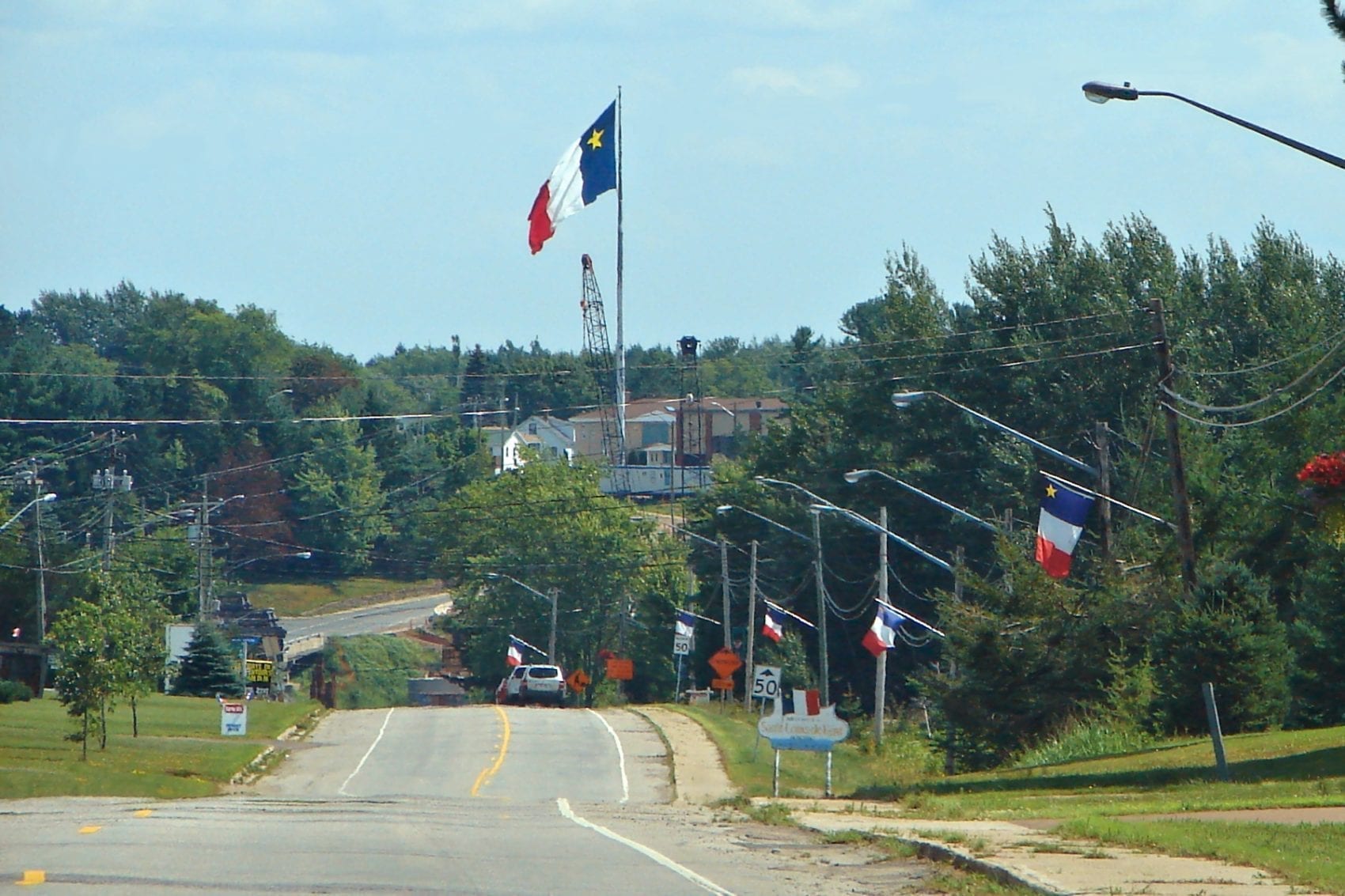 The giant Acadian flag at Saint-Louis-de-Kent and the Acadian giant who  designed it – Salut Canada